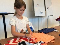 203 Buntes Kuschelkissen mit Fransen (1)